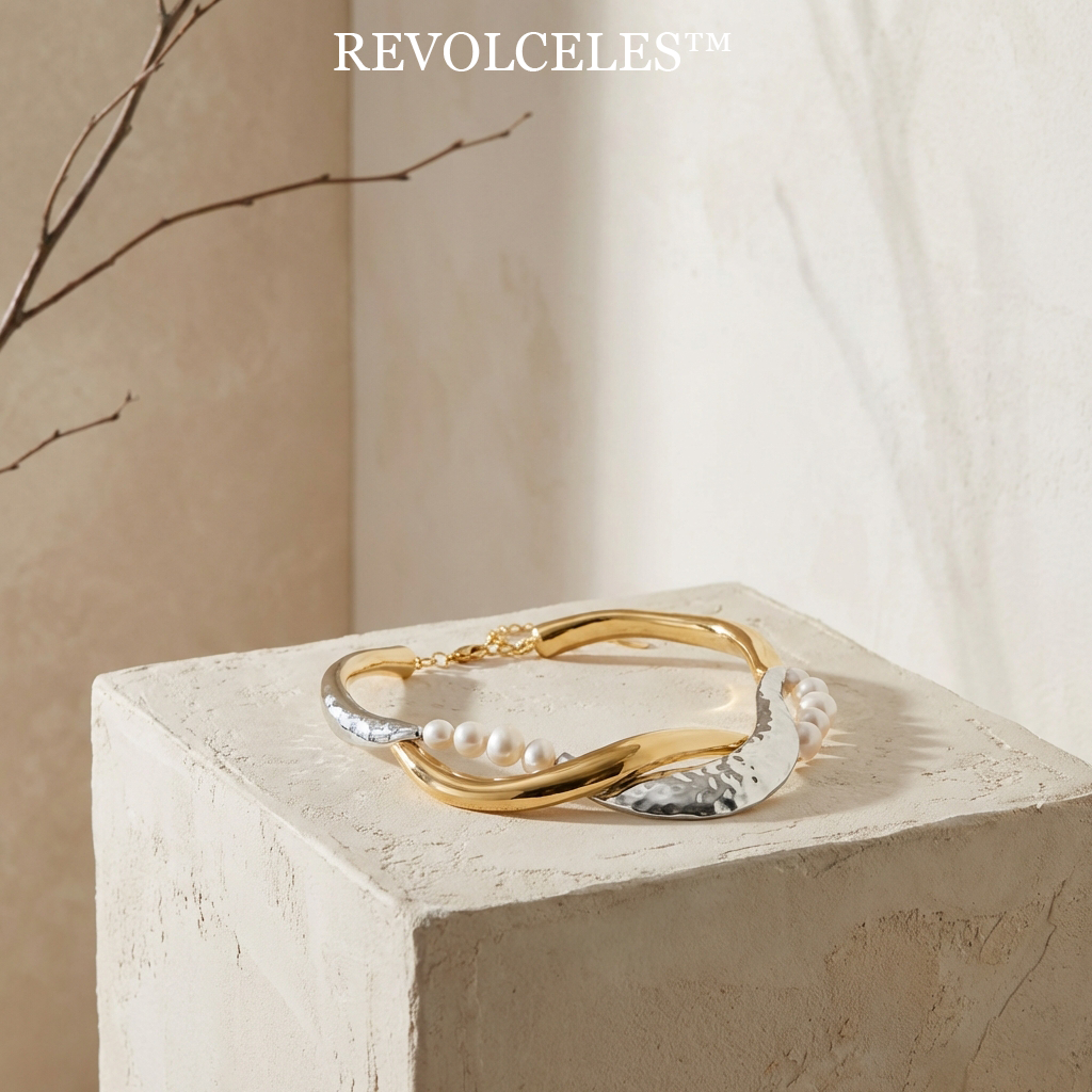 🐚Revolceles THE LUMINA-PEARL COLLAR -"A study in elemental contrast. Where the fluid motion of molten gold meets the lunar glow of freshwater pearls and the brutalist bite of hammered silver."